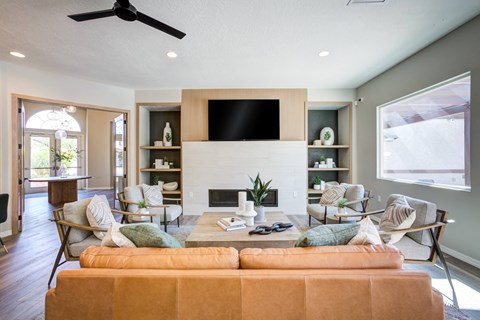 a living room with a couch and a tv